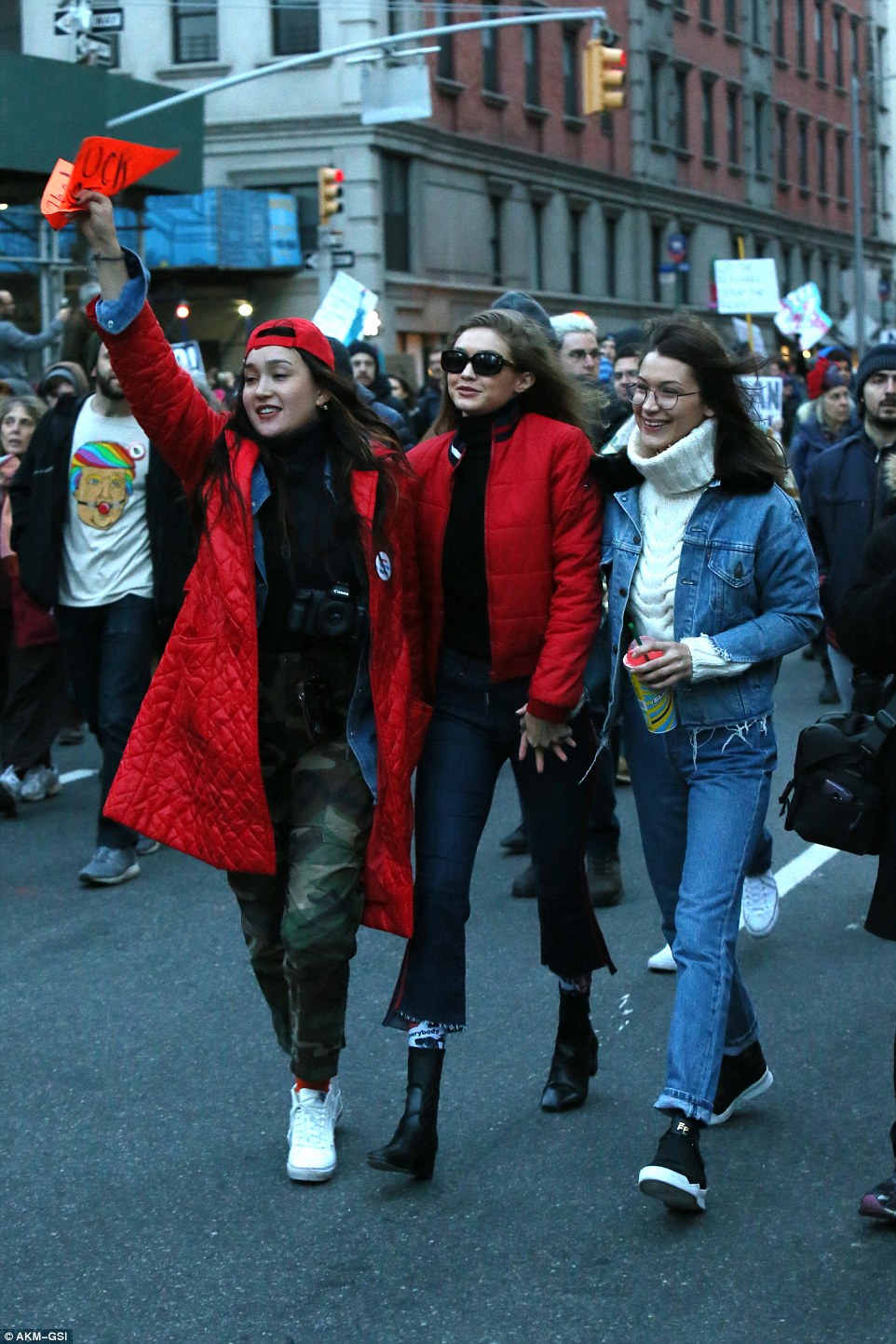 Models Bella and Gigi Hadid joined in the protest against President Trump's immigration ban on the streets of New York City