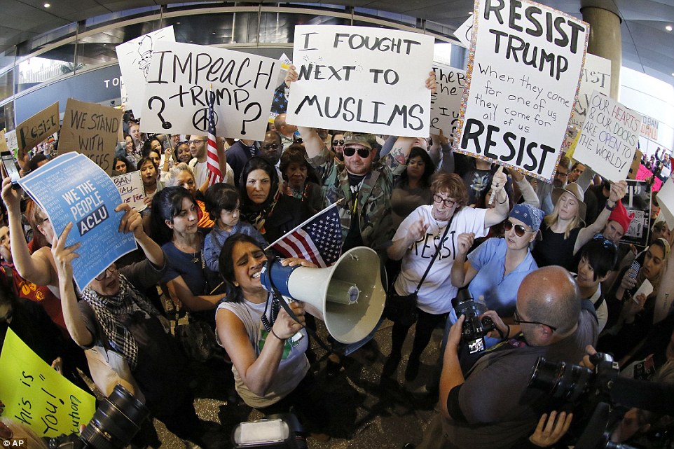 'I fought next to Muslims': A veteran was seen among the crowd of demonstrators who gathered at Los Angeles International
