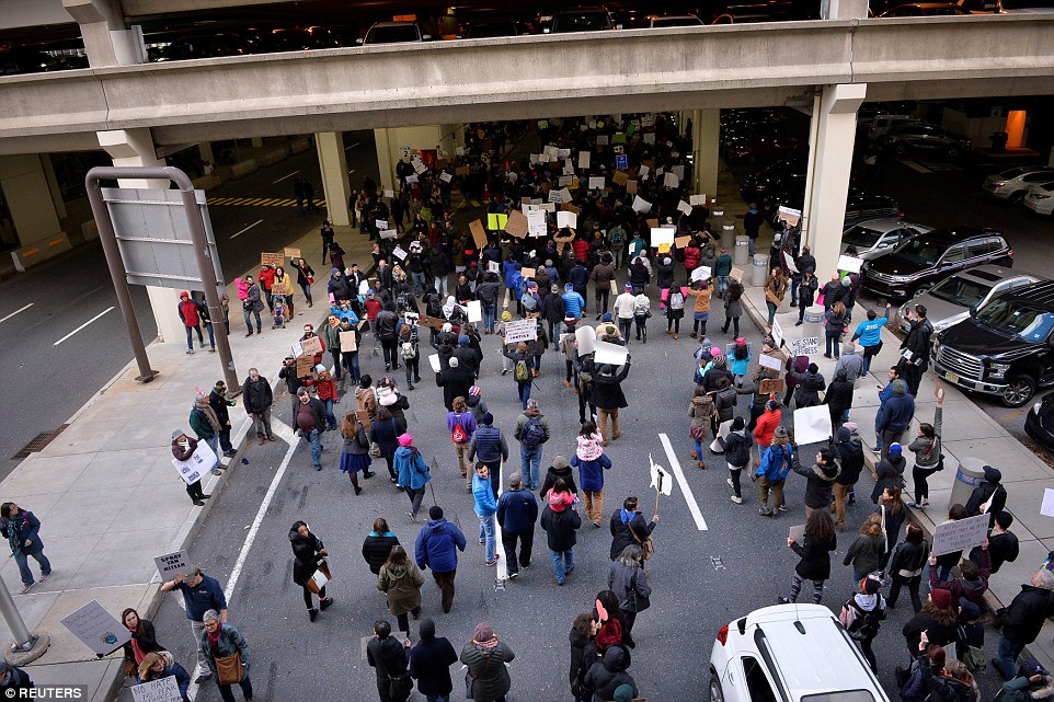 Demonstrators marched and blocked traffic during protests outside Philadelphia International Airport on Sunday