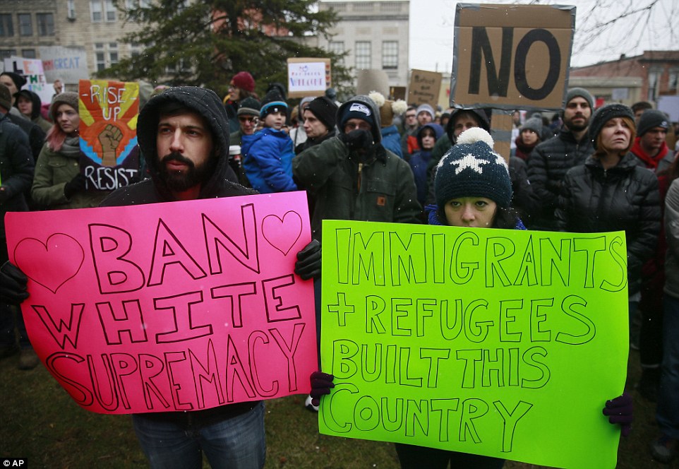 Demonstrators braved the cold in Bloomington, Indiana to rally at the Monroe County Courthouse in response to Trump's ban