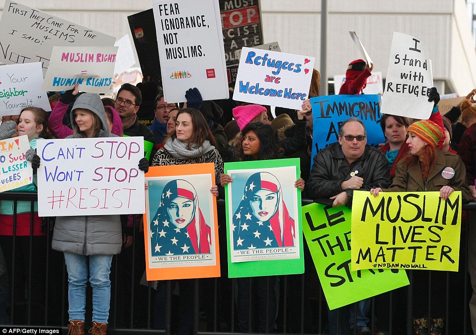 Protesters crowded the sidewalks at HartsfieldJackson Atlanta International Airport to denounce Trump's executive order