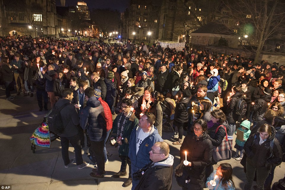 Hundreds of people gathered outside of Sterling Memorial Library at Yale University in New Haven, Connecticut Sunday