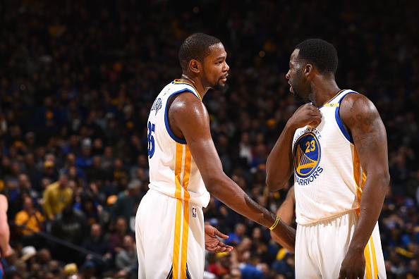 OAKLAND, CA - JANUARY 18: Kevin Durant #35 talks with Draymond Green #23 of the Golden State Warriors during the game against the Oklahoma City Thunder on January 18, 2017 at ORACLE Arena in Oakland, California. NOTE TO USER: User expressly acknowledges a