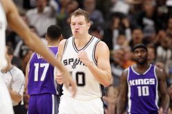 Mar 8, 2017; San Antonio, TX, USA; San Antonio Spurs power forward David Lee (10) reacts after hitting a two-point shot and being fouled during the second half against the Sacramento Kings at AT&T Center. Mandatory Credit: Soobum Im-USA TODAY Sports