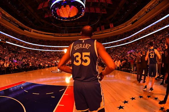 PHILADELPHIA,PA - FEBRUARY 27 : Kevin Durant #35 of the Golden State Warriors looks on prior to the game against the Philadelphia 76ers at Wells Fargo Center on February 27, 2017 in Philadelphia, Pennsylvania NOTE TO USER: User expressly acknowledges and 