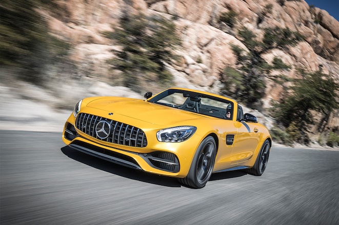 2018 Mercedes AMG GT C Roadster front three quarter in motion 04