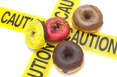 Four Donuts and Caution Tape